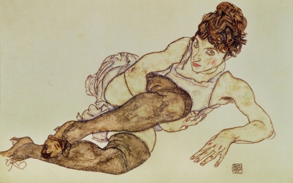 Эгон Шиле ( Egon Schiele; 1890 - 1918 ). Лежащая женщина в черных чулках , 1917 г. Гуашь и черный карандаш на бумаге.29,4 × 46